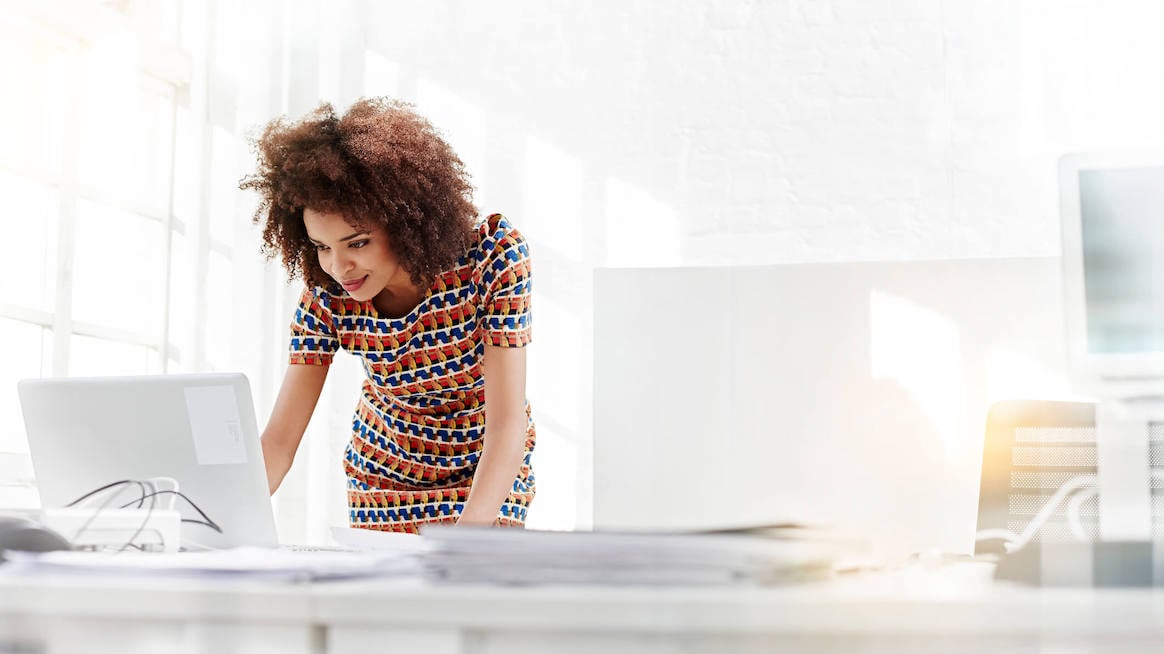 development-goals-at-work-woman-on-laptop 