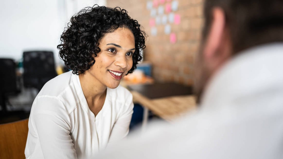 receptive-to-feedback-woman-smiling 