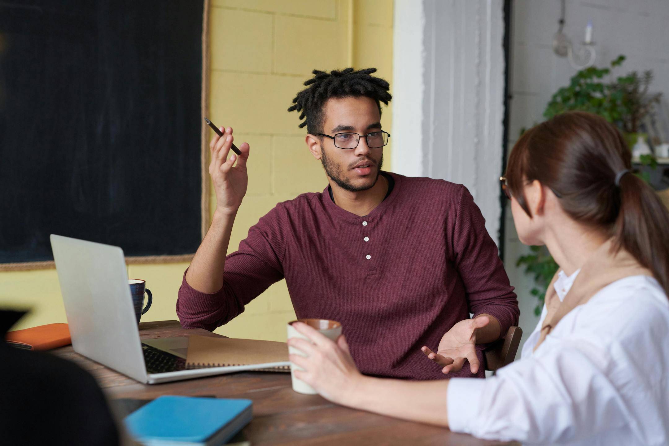 two-colleagues-practicing-assertive-communication