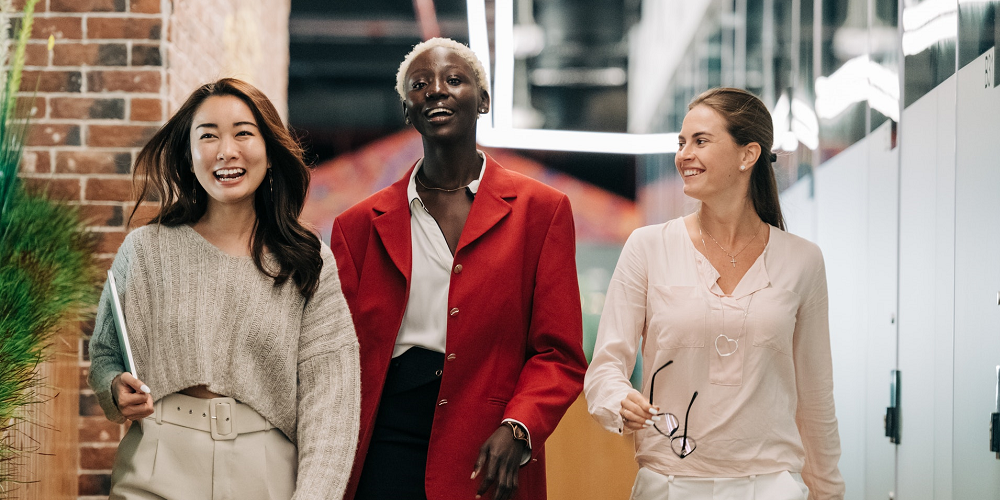 women walking down hallway - sense of belonging